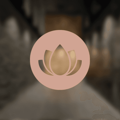 Rundes rosafarbenes Icon mit einer Lotusblüte in der Mitte.